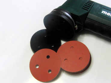 Sanding disc with holes